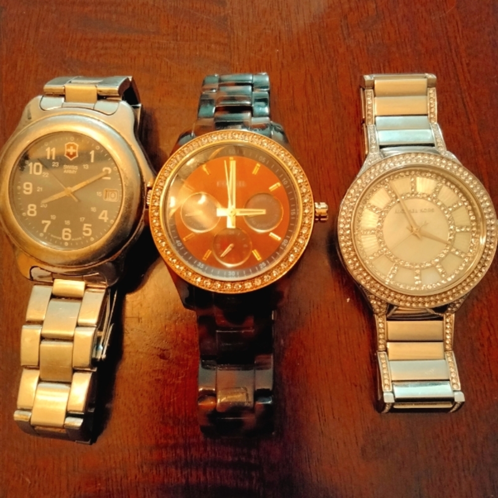 A Lot of 3 watches. Swiss, Kors and Fossil